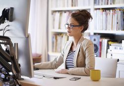 Law Librarian sitting at her desk