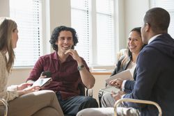 Business people talking in office meeting