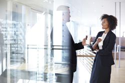 Business people having casual meeting with coffee : Stock Photo View similar imagesMore from this photographerDownload comp Caption:Corporate business people, modern architecture Business people having casual meeting with coffee