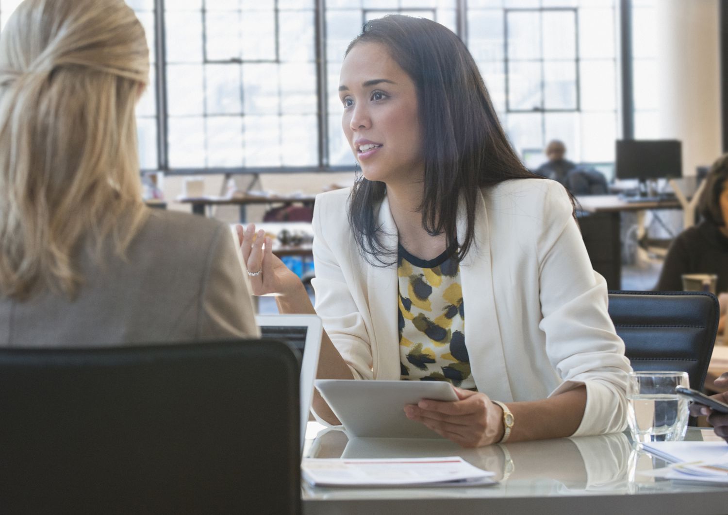 Woman manager reviewing female employee