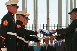 Marines handing over folded flag