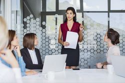 businesswoman leading a meeting