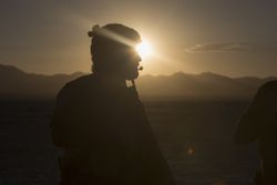 military officer on the radio in the dessert