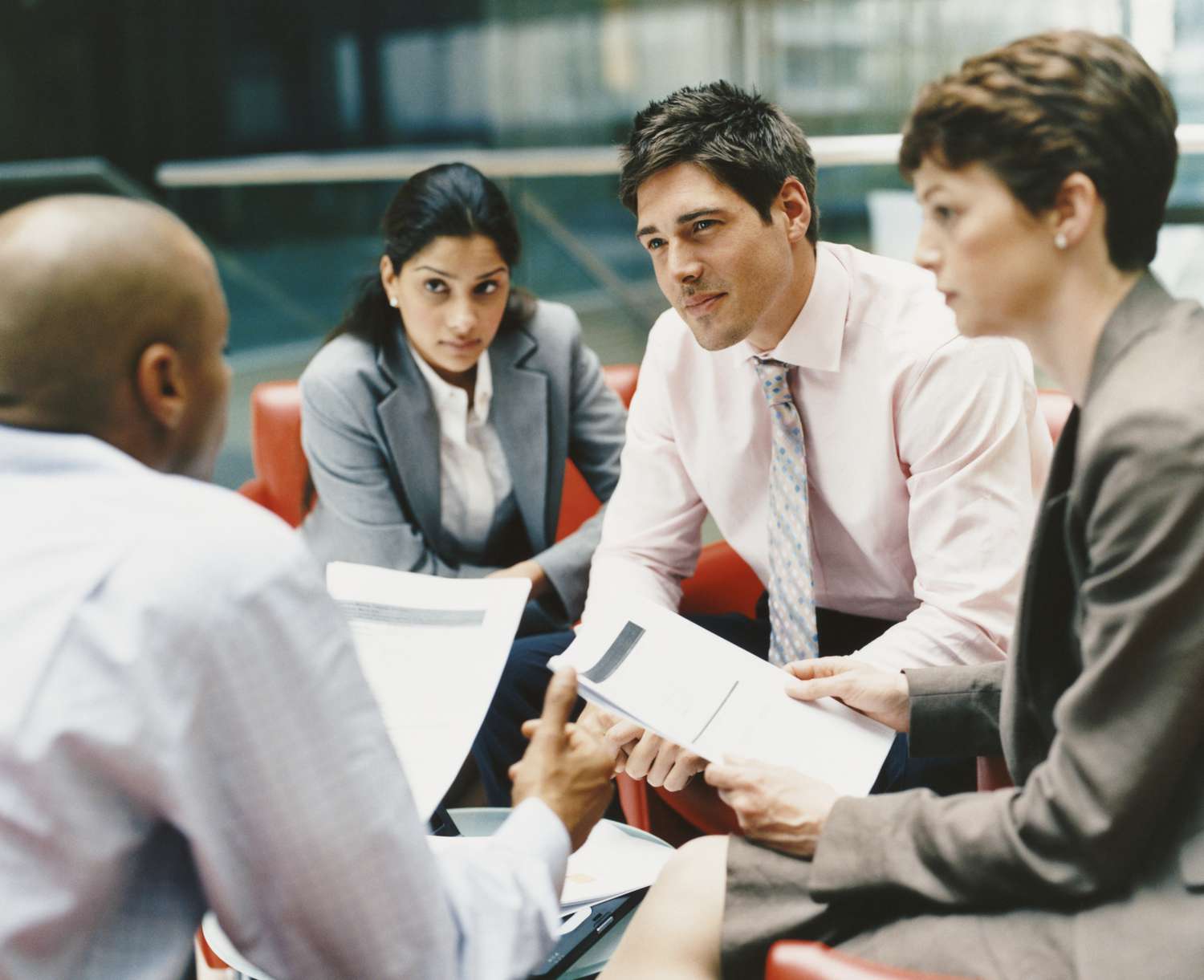 People sitting in group meeting