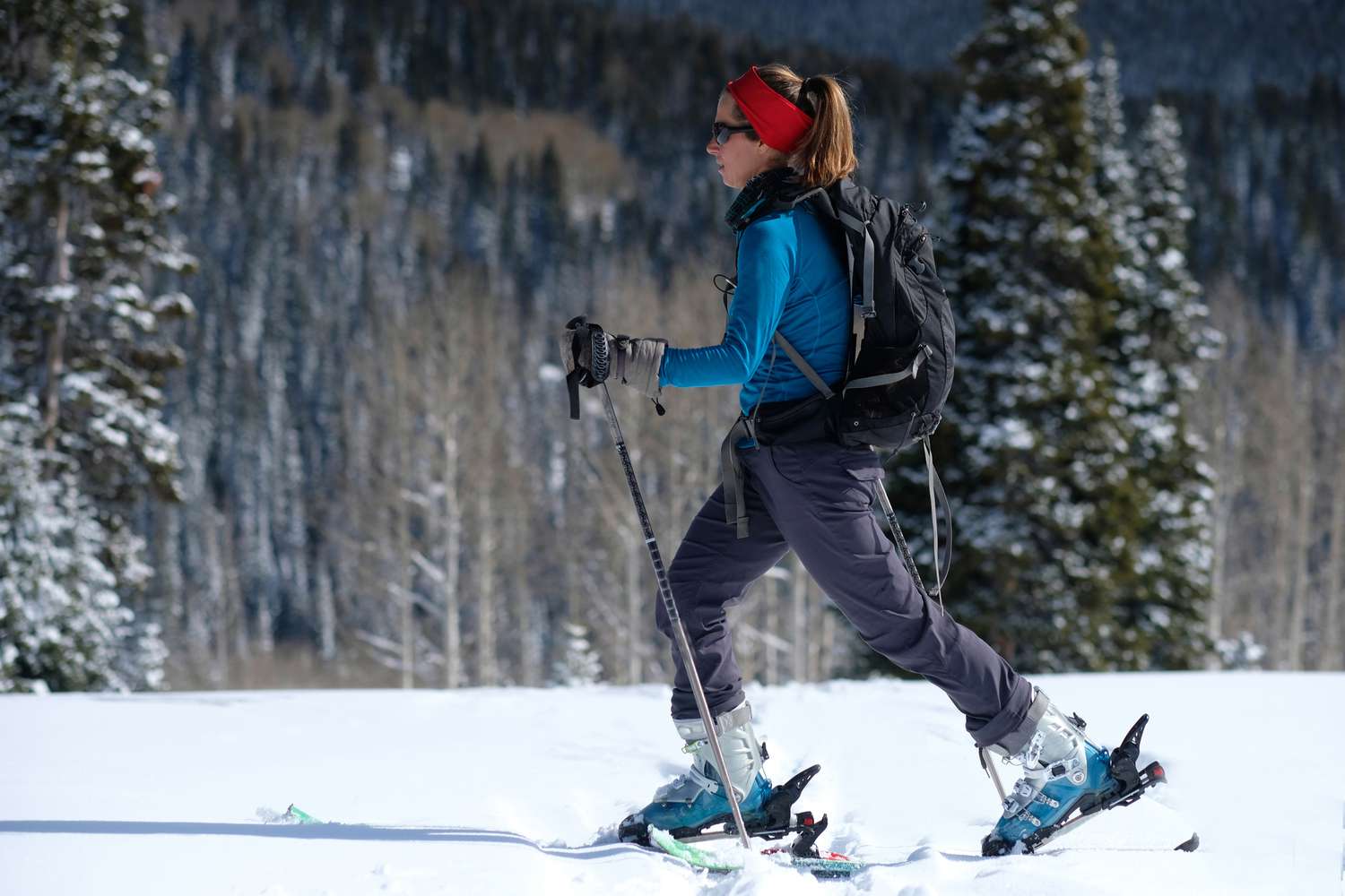 Woman backcountry randonee skiing on Rabbit Ears Pass in Colorado