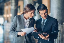 Lawyers reviewing legal documents and ediscovery documents during a litigation process