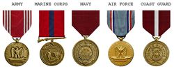 Good conduct medals from the Army, Marine Corps, Navy, Air Force, and Coast Guard