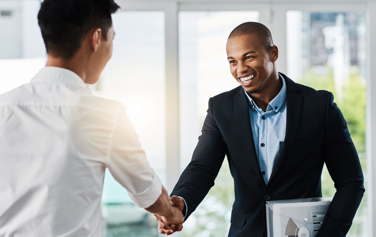 An applicant is well dressed in business casual for an interview