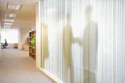 Shadow of business people in conference room