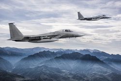 F-15 Eagles in Flight showing that one of the hardest Air Force jobs is that of a pilot.