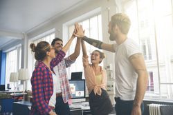 young business entrepreneurs celebrating a success