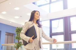 Woman going to interview with portfolio