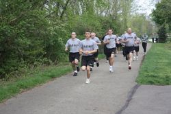 men running in army physical fitness test (APFT)