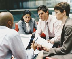 A group of co-workers sitting around