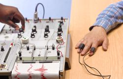 Man taking a polygraph exam as part of qualifying for a job in security.