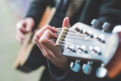 Musician playing guitar