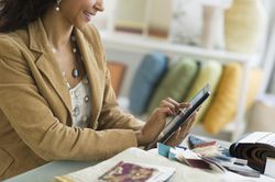 An interior designer using a tablet.