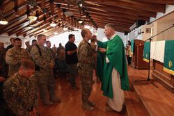 Military chaplains at church service with U.S. Soldiers