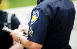 Police officer writing a ticket