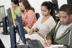 Students taking notes in class