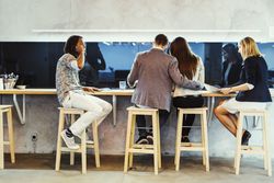 Group of people having a break in the cafeteria