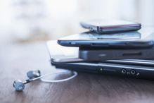 USA, New Jersey, Jersey City, Close up of stack of devices on desk