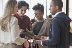 Business people using digital tablet